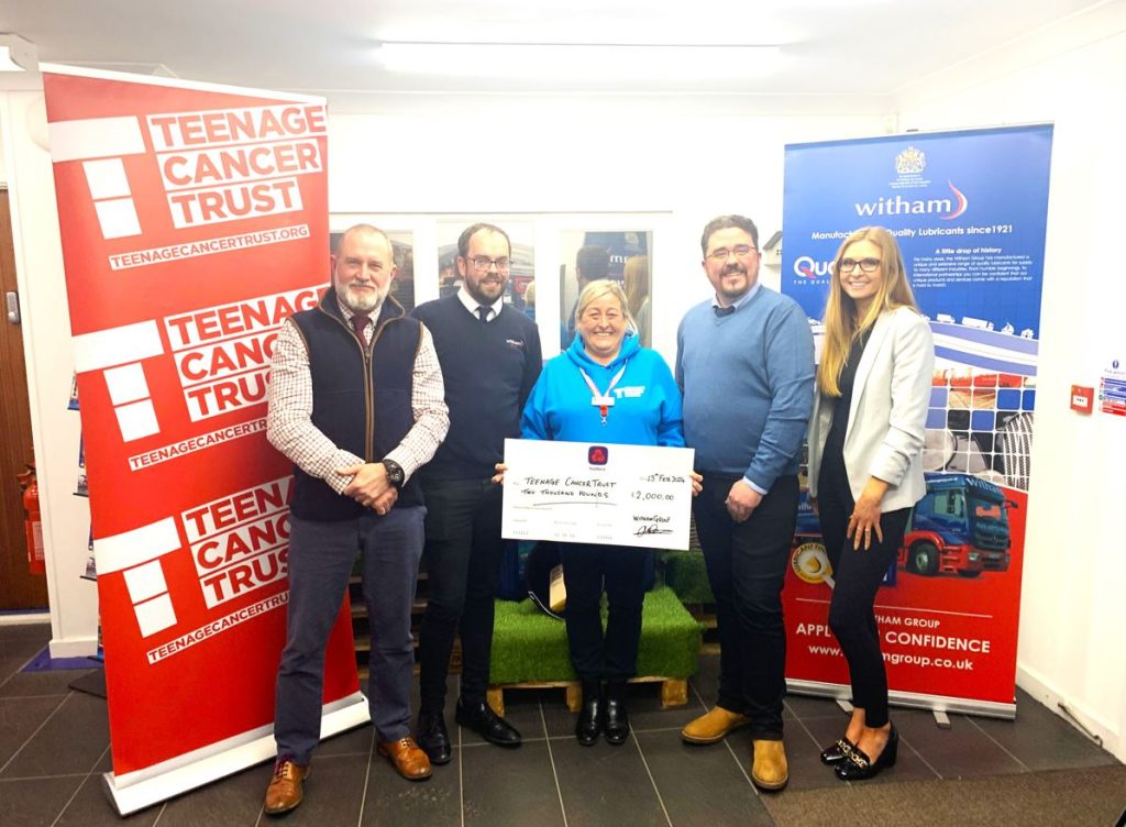 The Witham Soham Team present the fundraising donation to the Teenage Cancer Trust.