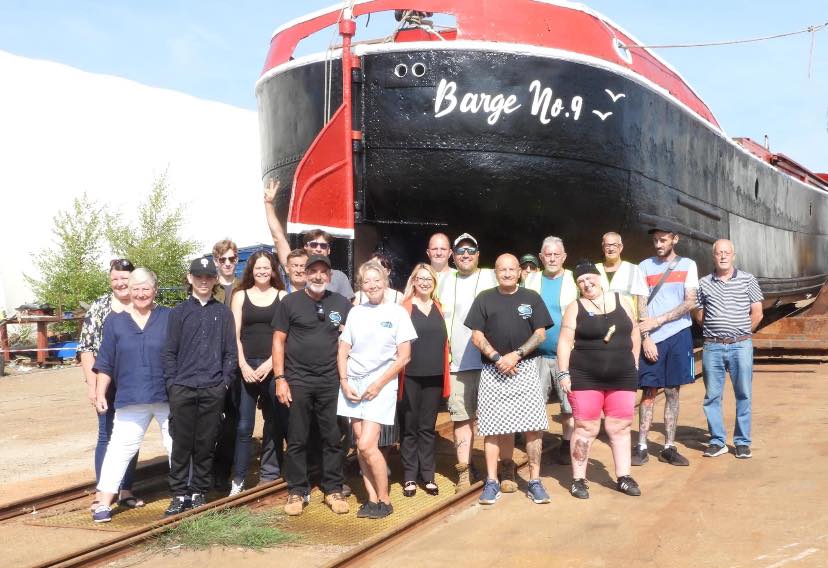 Barge 9 paint restoration team