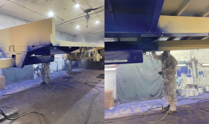 Paint being applied to trailer